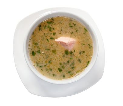 Vegetable soup with salmon isolated on white background.