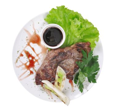 grilled t-bone steak and vegetables