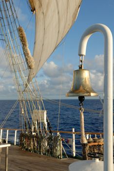 Details of a sailing ship on the background of the ocean