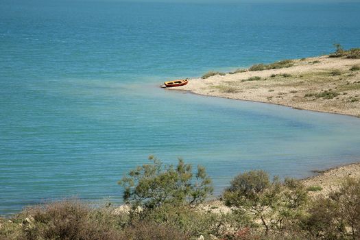 boat on a lake with beautiful water