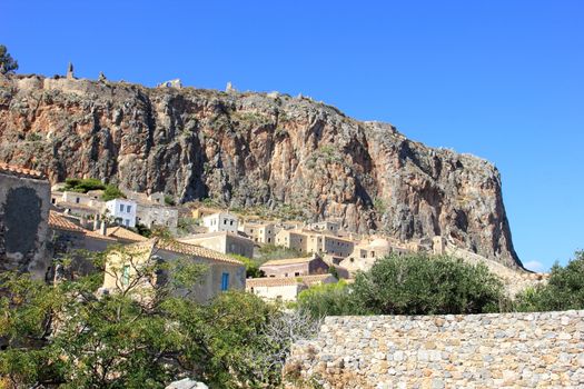 monemvasia old town and the ruins of a castle on the top of the rock