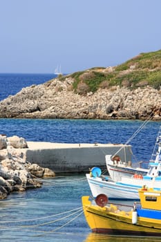 fishing boats on the port of a grrek island