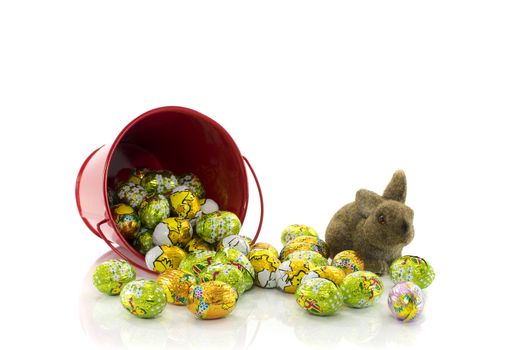 red bucket with easter eggs and bunny