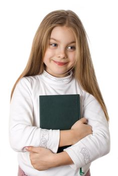 Little girl holding book, posing to camera