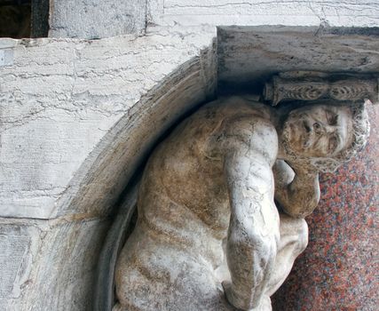 A stone Atlas carries a heavy charge, taken in Venice