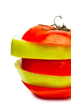 Sections of fresh ripe green apple and red tomato isolated over white background. Diet concept