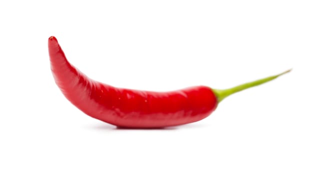 Closeup view of red chili pepper isolated over white background