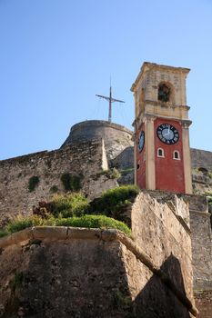 old tower clock in the entrance of a fort in corfu