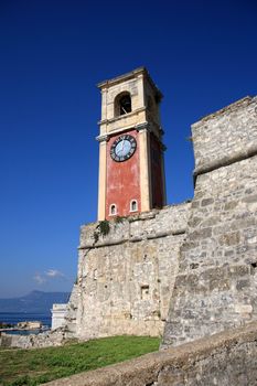 old tower clock in the entrance of a fort in corfu