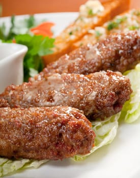 Italian cuisine.beef cutlets with vegetableon 