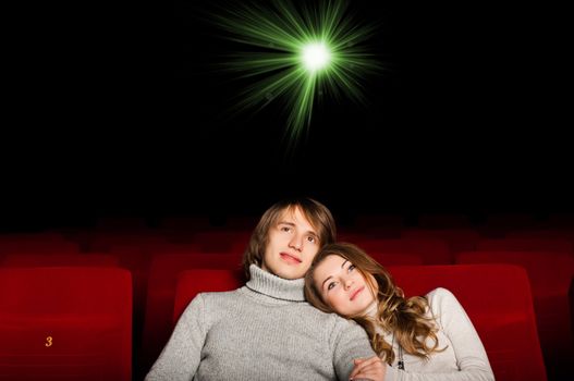 young couple in the cinema to enjoy the movie