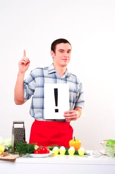 Chef holding a plate with an inscription exclamation mark