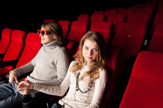 young couple in the cinema to enjoy the movie