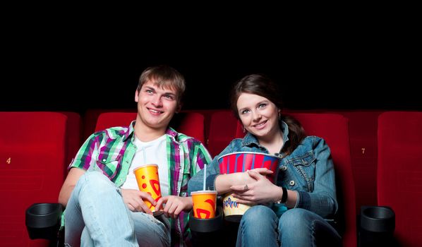 couple in a movie theater, watching a 3D movie