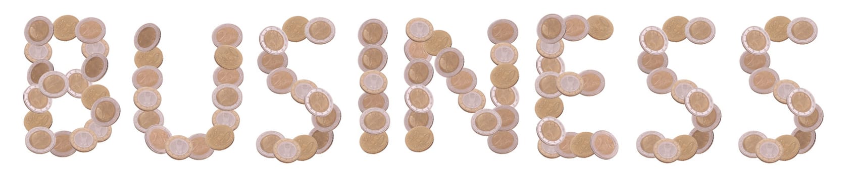 business - written with coins on white background