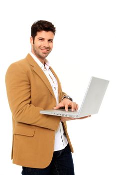 young handsome man holding a laptop isolated on a white background