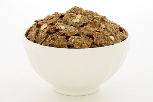 Delicious and nutritious bran flakes cereal, high in bran, high in fiber, served in a beautiful  French Cafe au Lait Bowl with wide rims.  This healthy bran cereal will be an aid to digestive health. 