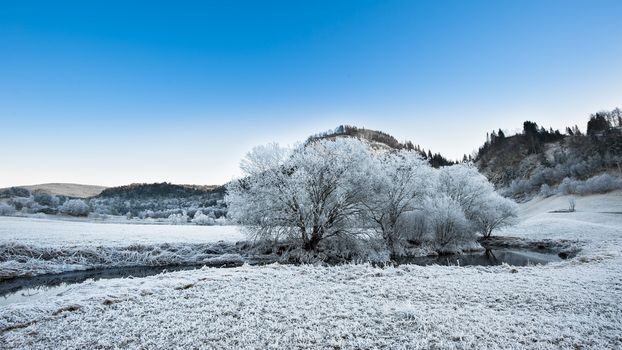 A river in frozen Norwegian landscape