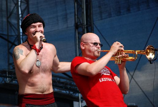 Oleksandr Iarmola and Eugene Didyk of the Ukrainian band Haydamaky play on stage at the Linz Europa Hafenfest 2009