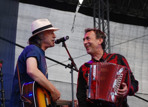 BAP frontman Wolfgang Niedecken performs with famous Austrian musician Hubert von Goisern at the Linz Europa Hafenfest 2009