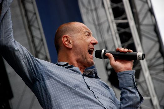 Austrian singer Willi Resetarits sings on stage at the Linz Europa Hafenfest 2009