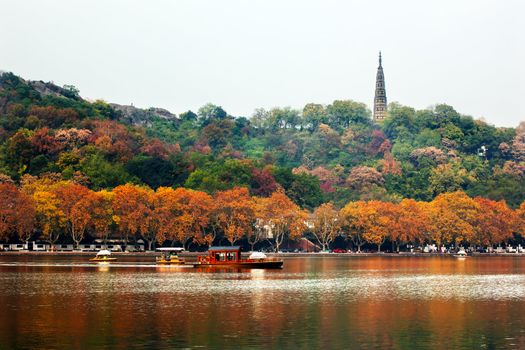 Ancient Baochu Pagoda West Lake Hangzhou Reflection Zhejiang China .  Pagoda was constructed in 963AD