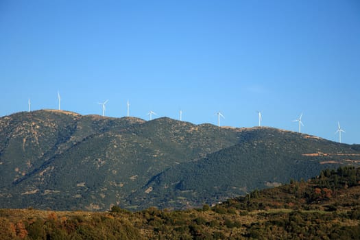 wind turbines on the top of mountains in greece