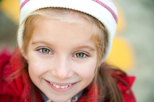 Smiling face of little girl closeup