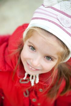 Smiling face of little girl outdoor
