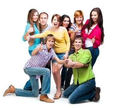 group of casual happy people smiling and standing isolated over a white background