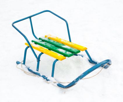 Sledge on a white snow