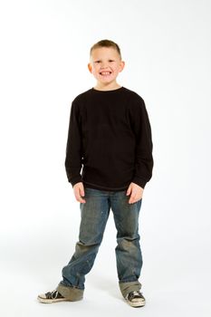 A young boy in the studio for a portrait against a white background.