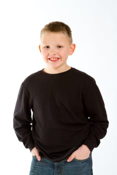 A young boy in the studio for a portrait against a white background.