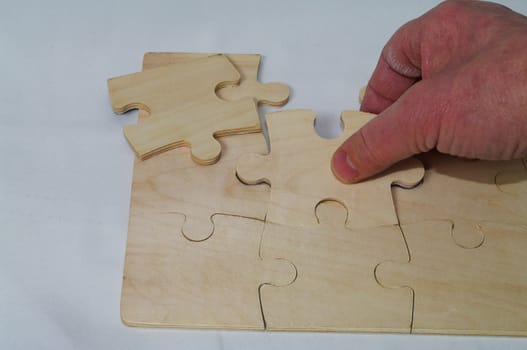 A puzzle being put together