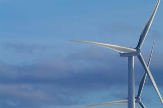Wind turbines against a winter sky