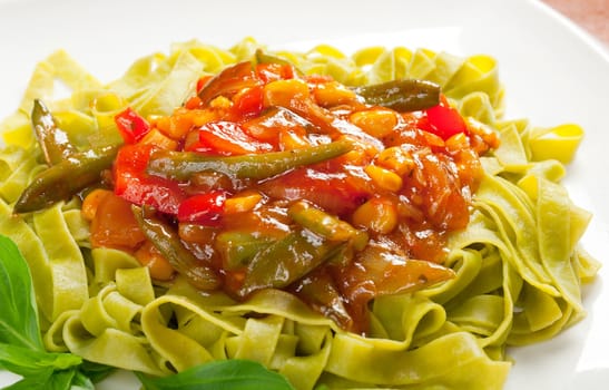 Spaghetti with tomato sauce and vegetables