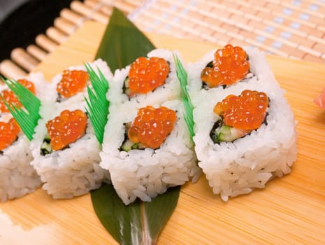 Japanese sushi .Roll made of Smoked fish and red roe