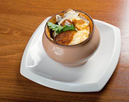 Omelette with cheese ceramic pot