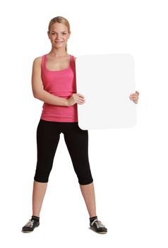 A young woman  holding an empty white bill board against a white background.