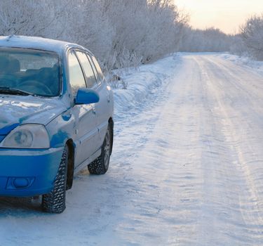 Snowy road surface from  car.Snowy country lane.winter freeway
