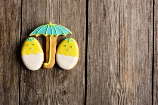 Easter homemade gingerbread cookie over wooden table