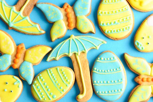 Easter homemade gingerbread cookie over blue