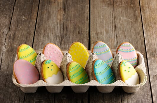 Easter homemade gingerbread cookie over wooden table