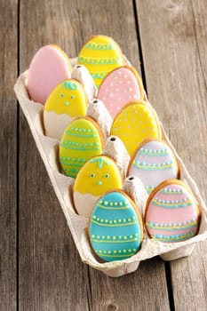 Easter homemade gingerbread cookie over wooden table