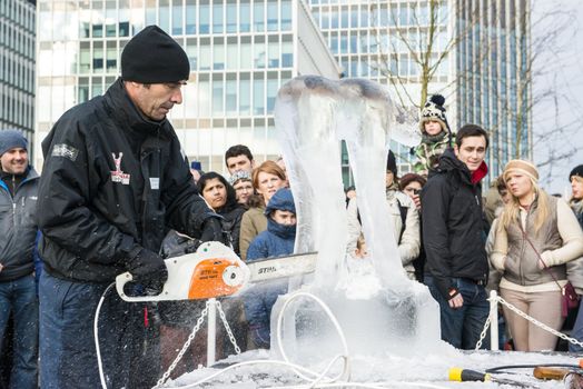 LONDON, UK - JANUARY 13: Artists compete in the freestyle category at the London Ice Sculpture Festival, in Canary Wharf. January 13, 2013 in London.