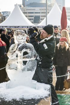 LONDON, UK - JANUARY 13: Artists compete in the freestyle category at the London Ice Sculpture Festival, in Canary Wharf. January 13, 2013 in London.