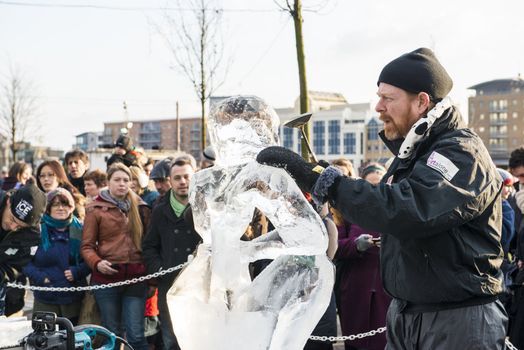 LONDON, UK - JANUARY 13: Artists compete in the freestyle category at the London Ice Sculpture Festival, in Canary Wharf. January 13, 2013 in London.