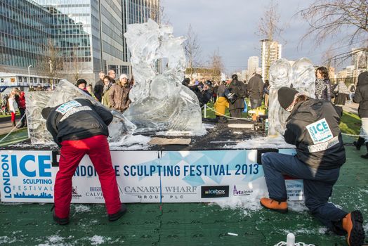 LONDON, UK - JANUARY 13: Artists compete in the freestyle category at the London Ice Sculpture Festival, in Canary Wharf. January 13, 2013 in London.