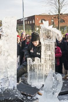LONDON, UK - JANUARY 13: Artists compete in the freestyle category at the London Ice Sculpture Festival, in Canary Wharf. January 13, 2013 in London.