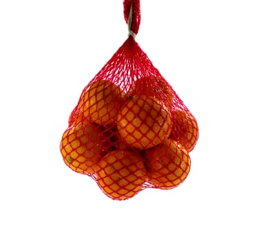 red net with mandarines isolated on white